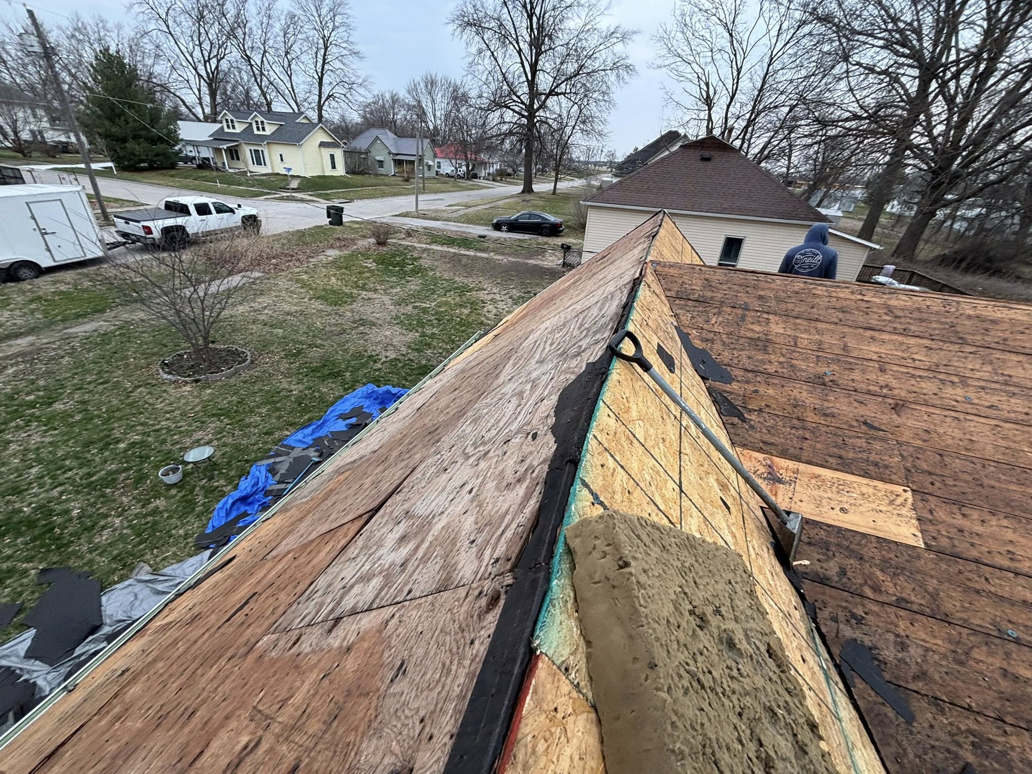 Roof decking exposed during a residential roof replacement project